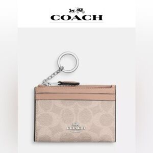 Coach Mini Skinny Id Case
In Signature Canvas. SV/Sand/Taupe/Silver #CW870. NWT